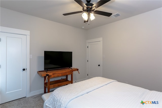 carpeted bedroom featuring ceiling fan