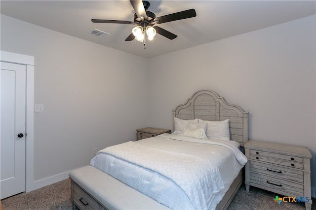 bedroom with ceiling fan and carpet flooring