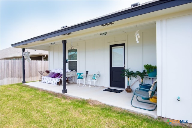 exterior space featuring a lawn and a patio