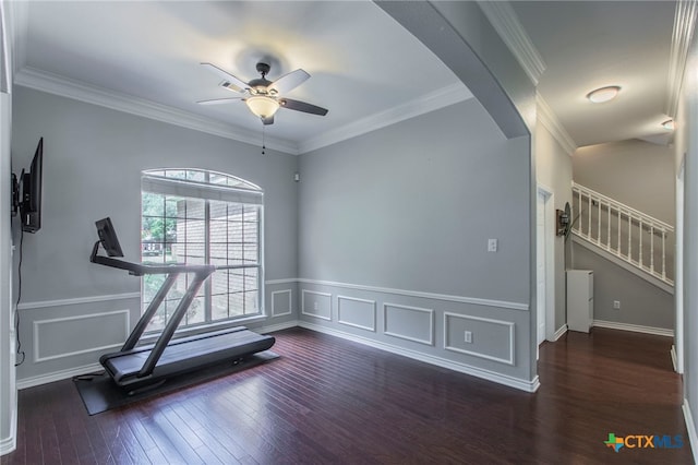 11503 Meredith Dr, Belton, TX 76513 - workout area featuring a ceiling fan, arched walkways, hardwood / wood-style floors, a wainscoted wall, and crown molding