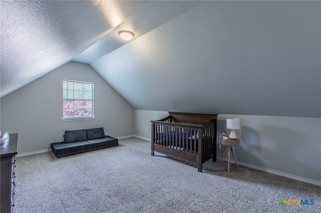 11503 Meredith Dr, Belton, TX 76513 - carpeted bedroom featuring vaulted ceiling and a textured ceiling