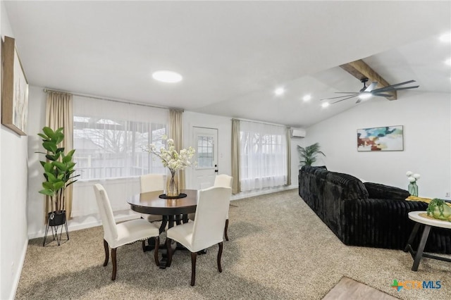 carpeted dining area featuring vaulted ceiling with beams, an AC wall unit, and ceiling fan