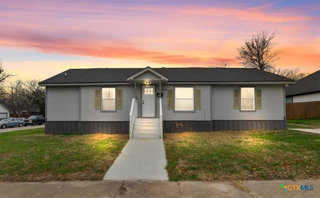 manufactured / mobile home with a lawn