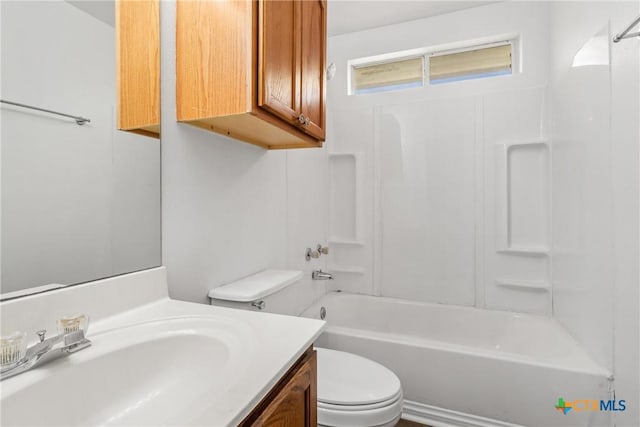 full bathroom with vanity, shower / bath combination, and toilet