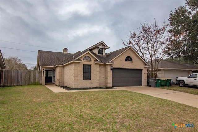 traditional home featuring driveway, a front lawn, and brick siding