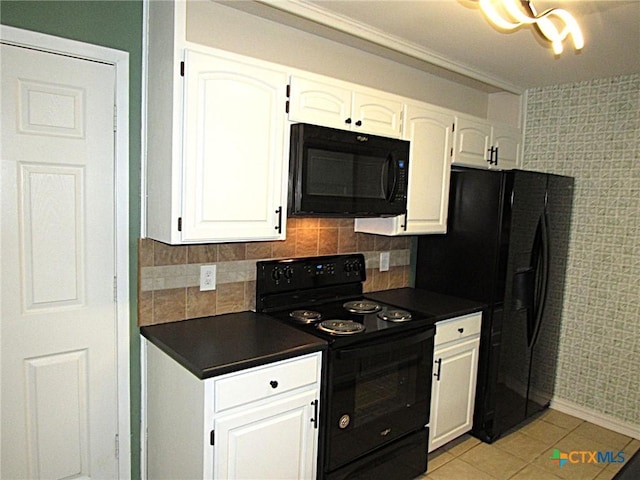 kitchen featuring dark countertops, white cabinets, black appliances, and light tile patterned floors