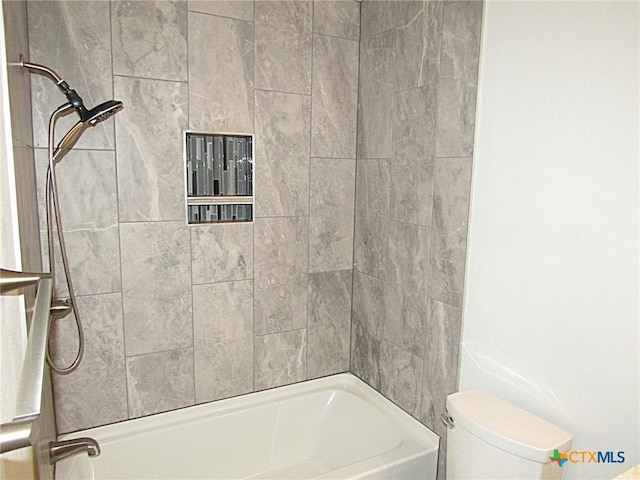 full bathroom with tub / shower combination and toilet