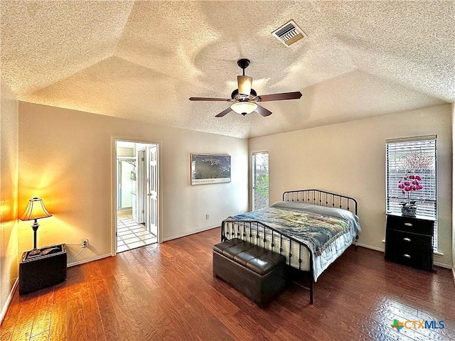 209 Westbrook Dr, Victoria, TX 77904 - bedroom with wood finished floors, a textured ceiling, and ceiling fan