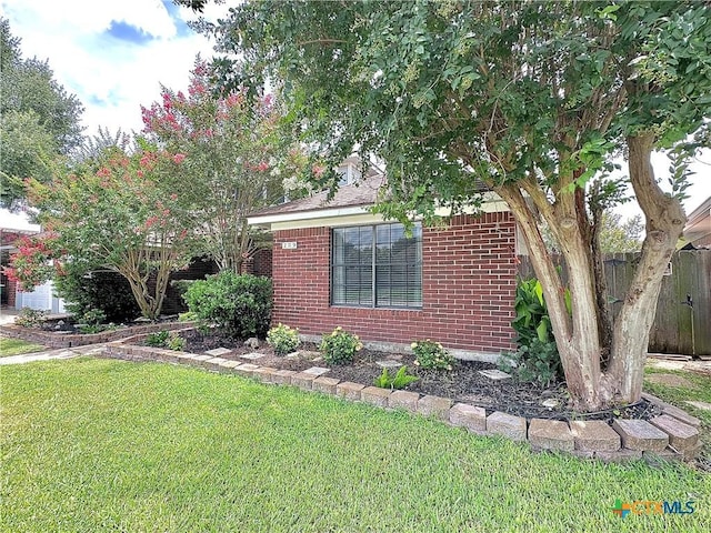 209 Westbrook Dr, Victoria, TX 77904 - obstructed view of property featuring brick siding