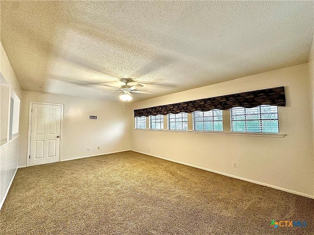 209 Westbrook Dr, Victoria, TX 77904 - spare room with a textured ceiling, a ceiling fan, and carpet