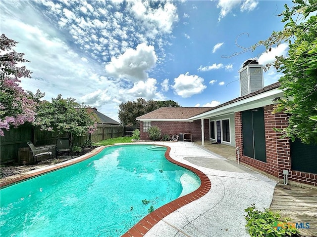 209 Westbrook Dr, Victoria, TX 77904 - view of swimming pool with a patio and a fenced backyard