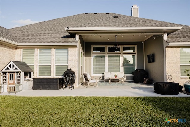110 Terra Vista Ranch Rd, Victoria, TX 77904 - rear view of property with brick siding, ceiling fan, roof with shingles, and a patio