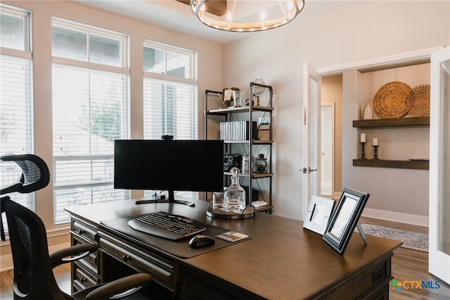 110 Terra Vista Ranch Rd, Victoria, TX 77904 - office with wood finished floors and a chandelier