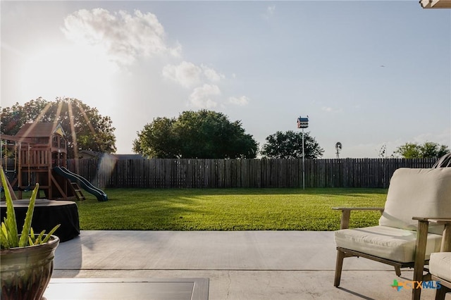 110 Terra Vista Ranch Rd, Victoria, TX 77904 - fenced backyard featuring a patio area and a playground