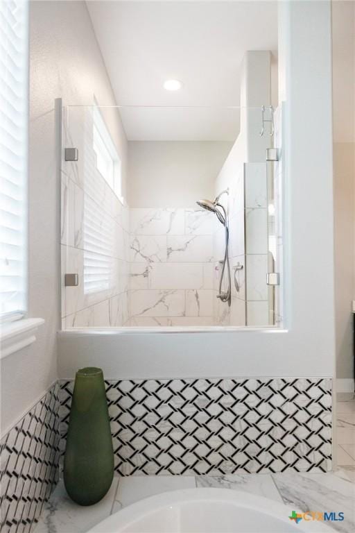 110 Terra Vista Ranch Rd, Victoria, TX 77904 - bathroom featuring a tile shower and a bath