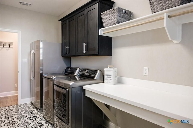 110 Terra Vista Ranch Rd, Victoria, TX 77904 - washroom featuring cabinet space and washer and dryer