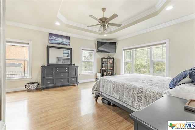 1402 Summer Glen Dr, Harker Heights, TX 76548 - bedroom featuring wood finished floors, ornamental molding, baseboards, a tray ceiling, and recessed lighting