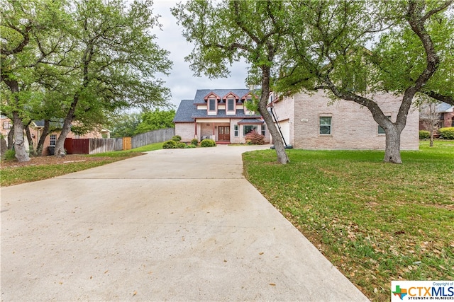 1402 Summer Glen Dr, Harker Heights, TX 76548 - view of front facade with concrete driveway, brick siding, and a garage