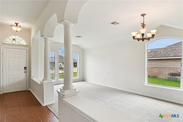 2010 Schorn Dr, Killeen, TX 76542 - tiled entrance foyer with ornate columns, plenty of natural light, a chandelier, and arched walkways