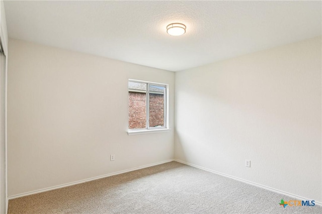 2010 Schorn Dr, Killeen, TX 76542 - spare room featuring carpet flooring and baseboards
