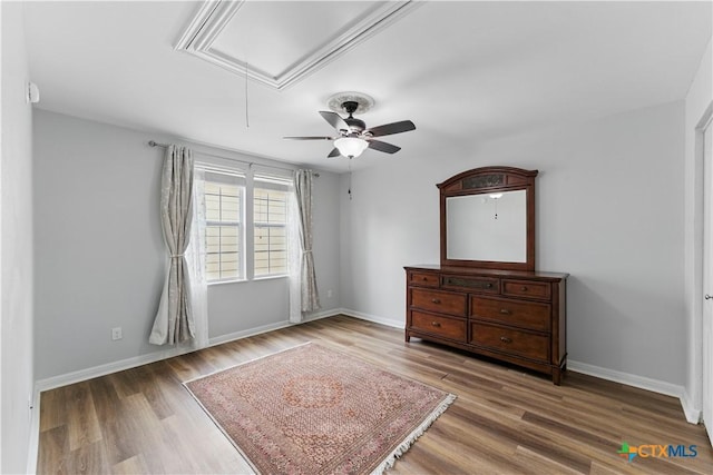 326 Trestle Tree, San Marcos, TX 78666 - bedroom with attic access, wood finished floors, and baseboards