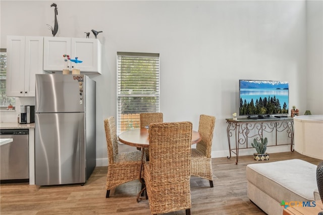 dining area featuring light hardwood / wood-style floors