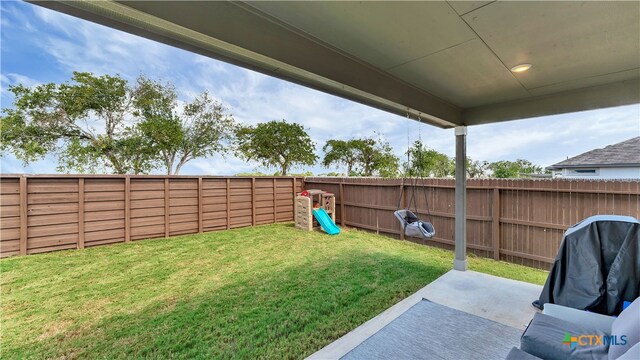 view of yard with a patio area