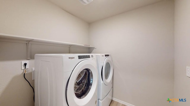 laundry area featuring washer and dryer