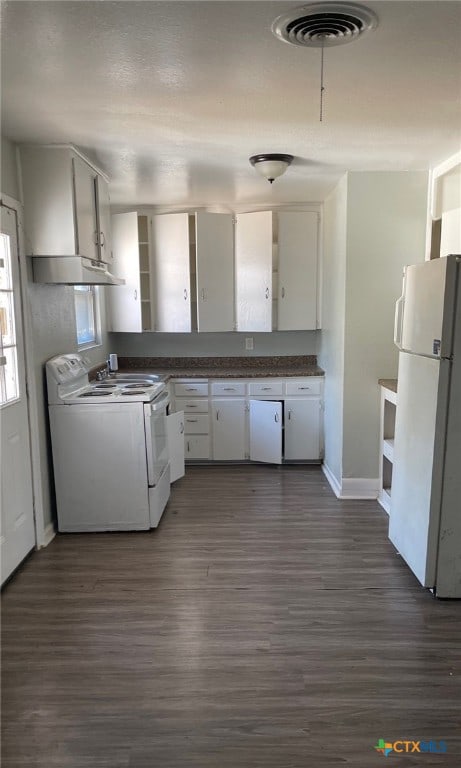 kitchen featuring white cabinets, dark hardwood / wood-style flooring, and white appliances