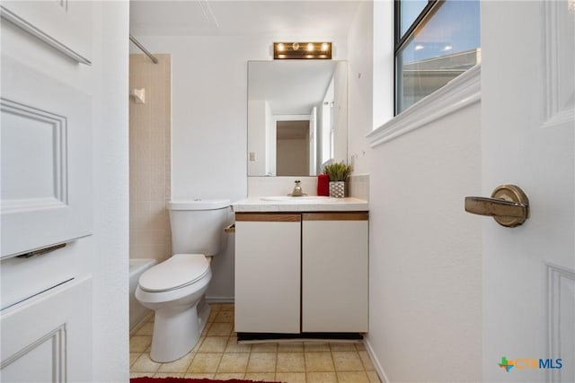 bathroom with toilet, shower / washtub combination, and vanity