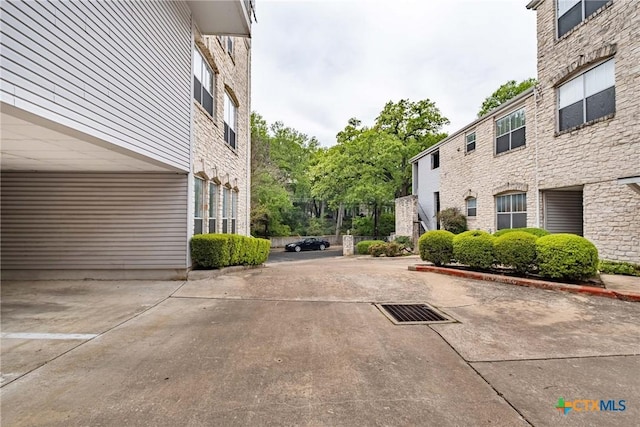 view of street with curbs