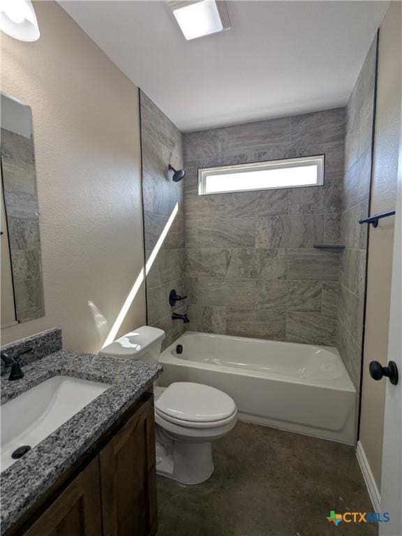 full bathroom featuring toilet, vanity, and tiled shower / bath