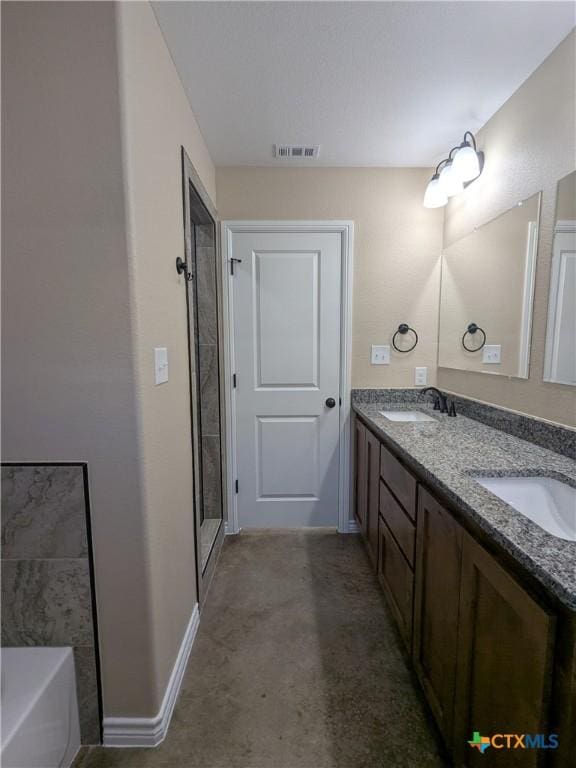 bathroom with vanity and separate shower and tub