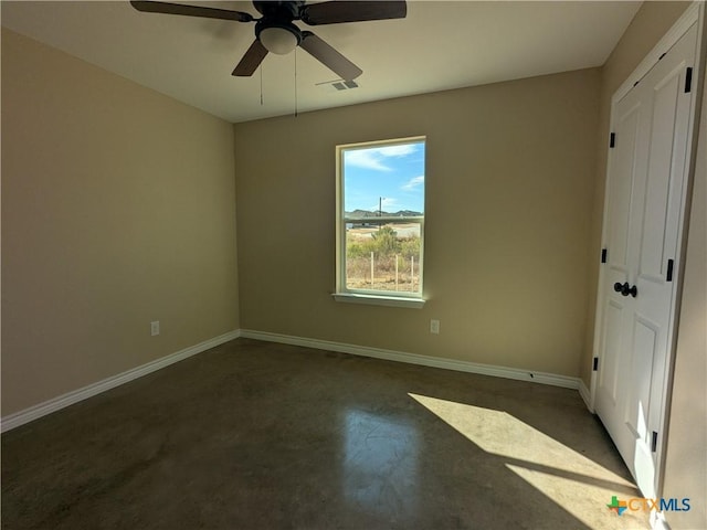 unfurnished bedroom featuring ceiling fan