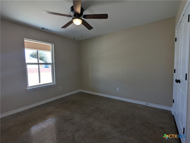 unfurnished room with ceiling fan