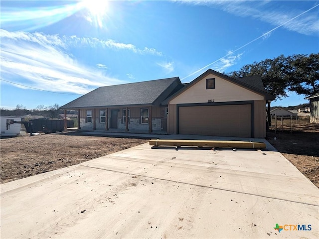 single story home with a garage