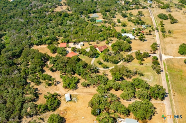 birds eye view of property featuring a rural view