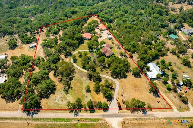 birds eye view of property with a rural view