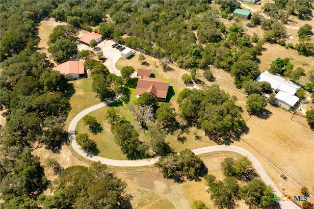 birds eye view of property with a rural view