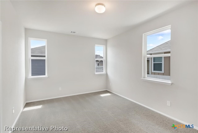 empty room with carpet floors