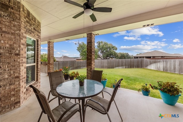 view of patio / terrace featuring ceiling fan