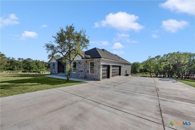 113 Cobblestone Ln, Burnet, TX 78611 - view of side of home featuring stone siding, an attached garage, driveway, and a yard