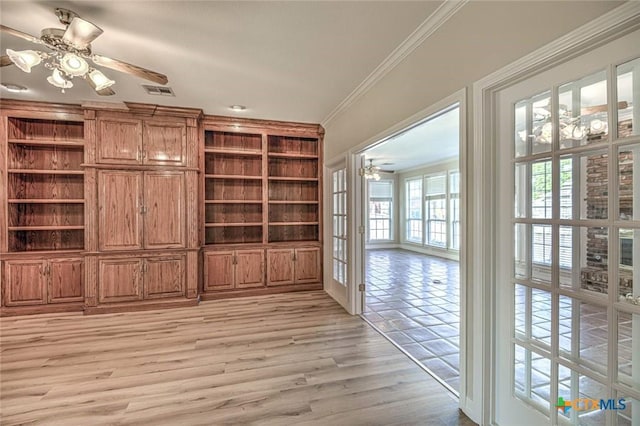 unfurnished living room featuring crown molding, french doors, ceiling fan, and light hardwood / wood-style floors