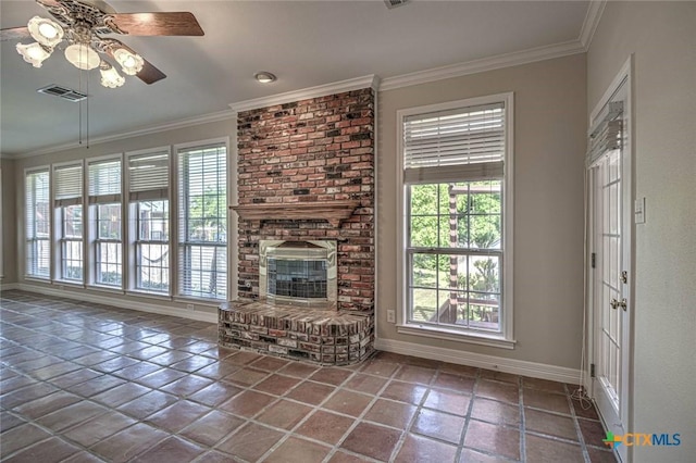 unfurnished living room featuring ceiling fan, ornamental molding, and a wealth of natural light