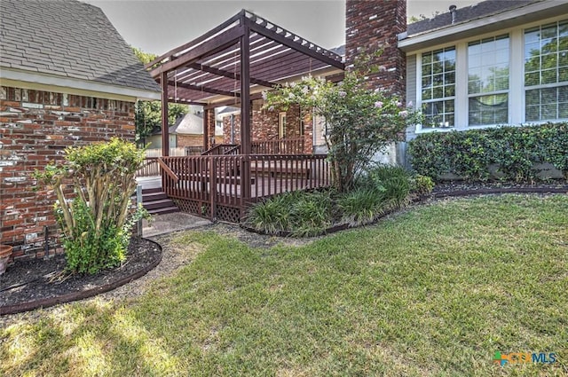 view of yard featuring a pergola and a wooden deck