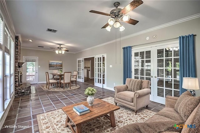 living room featuring french doors, dark tile patterned floors, ceiling fan, and crown molding