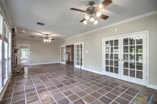 unfurnished living room featuring ceiling fan, french doors, dark tile patterned floors, and crown molding