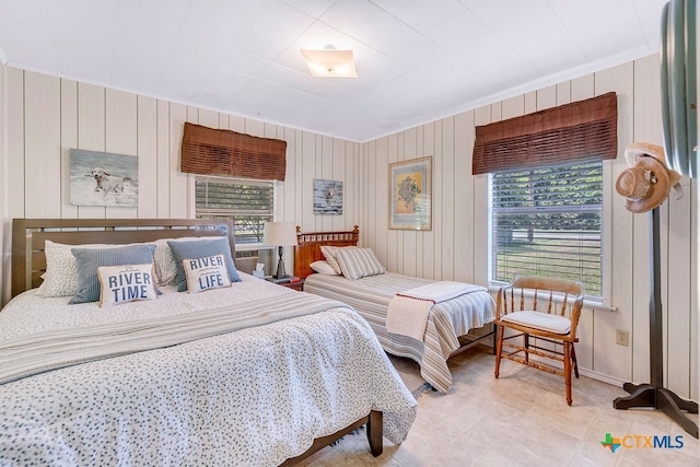 bedroom with crown molding