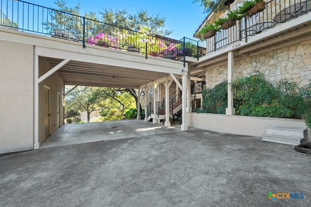 view of car parking featuring a carport