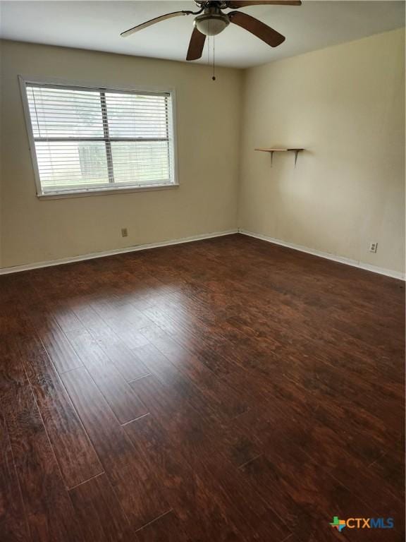 unfurnished room featuring dark hardwood / wood-style flooring and ceiling fan